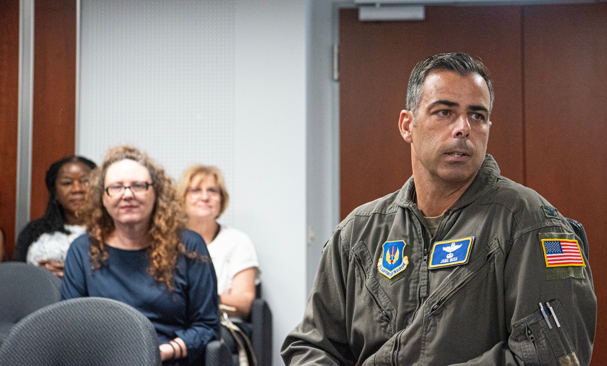 U.S. Air Force Col. Jamil I. Musa, 86th Airlift Wing deputy commander, talks to teachers during an immersion tour at Ramstein Air Base, Germany, Aug. 9, 2024. Musa told teachers from the Department of Defense Education Activity about how much he appreciated them for teaching the children of Airmen and other members of the Kaiserslautern Military Community. (U.S. Air Force photo by Senior Airman Thomas Karol)