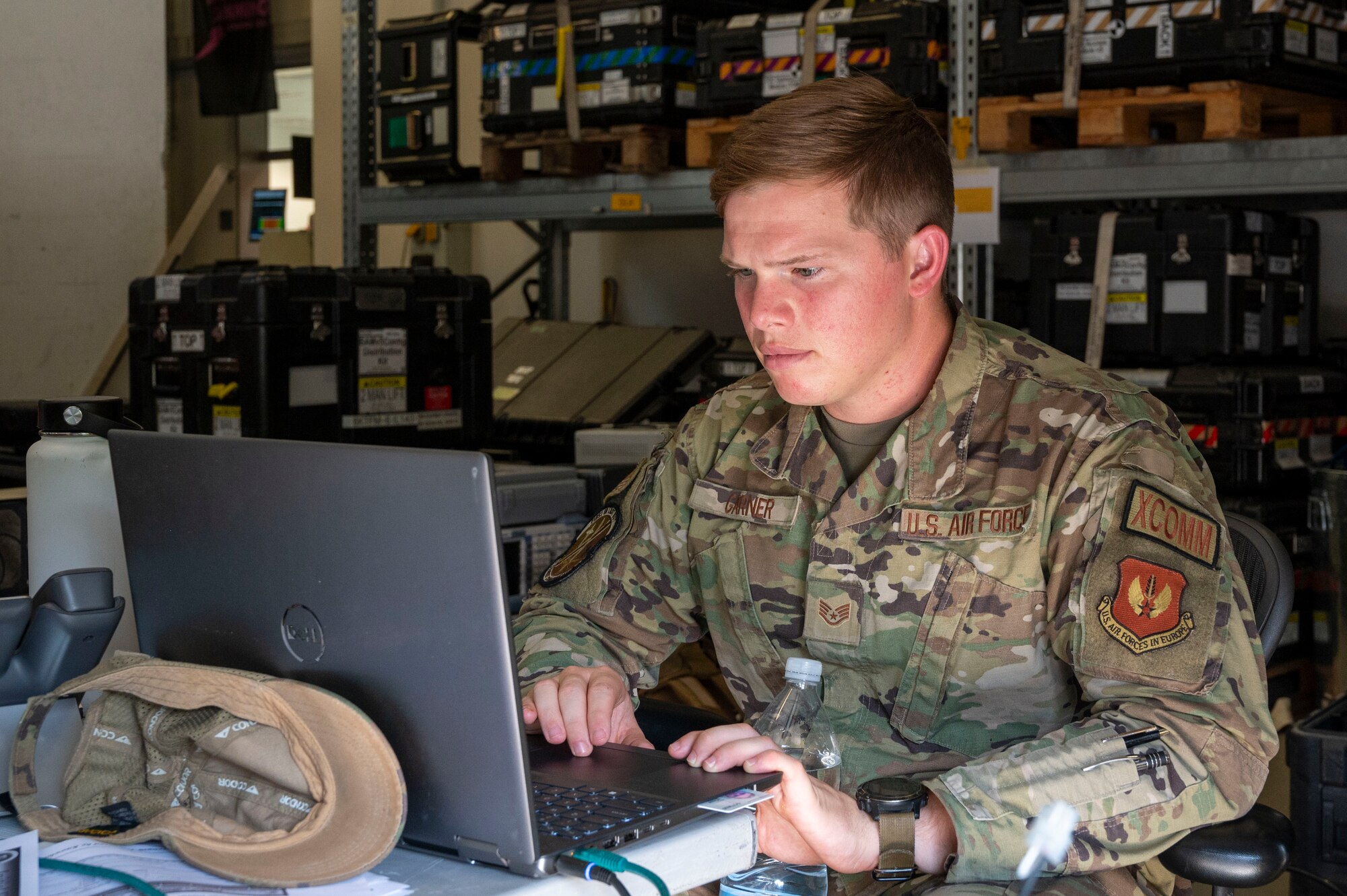 U.S. Air Force Staff Sgt. Austin Garner, 1st Combat Communications Squadron tactical communications planner, monitors a spectrograph during exercise Arcane Thunder 24 at Ramstein Air Base, Germany, Aug. 8, 2024.