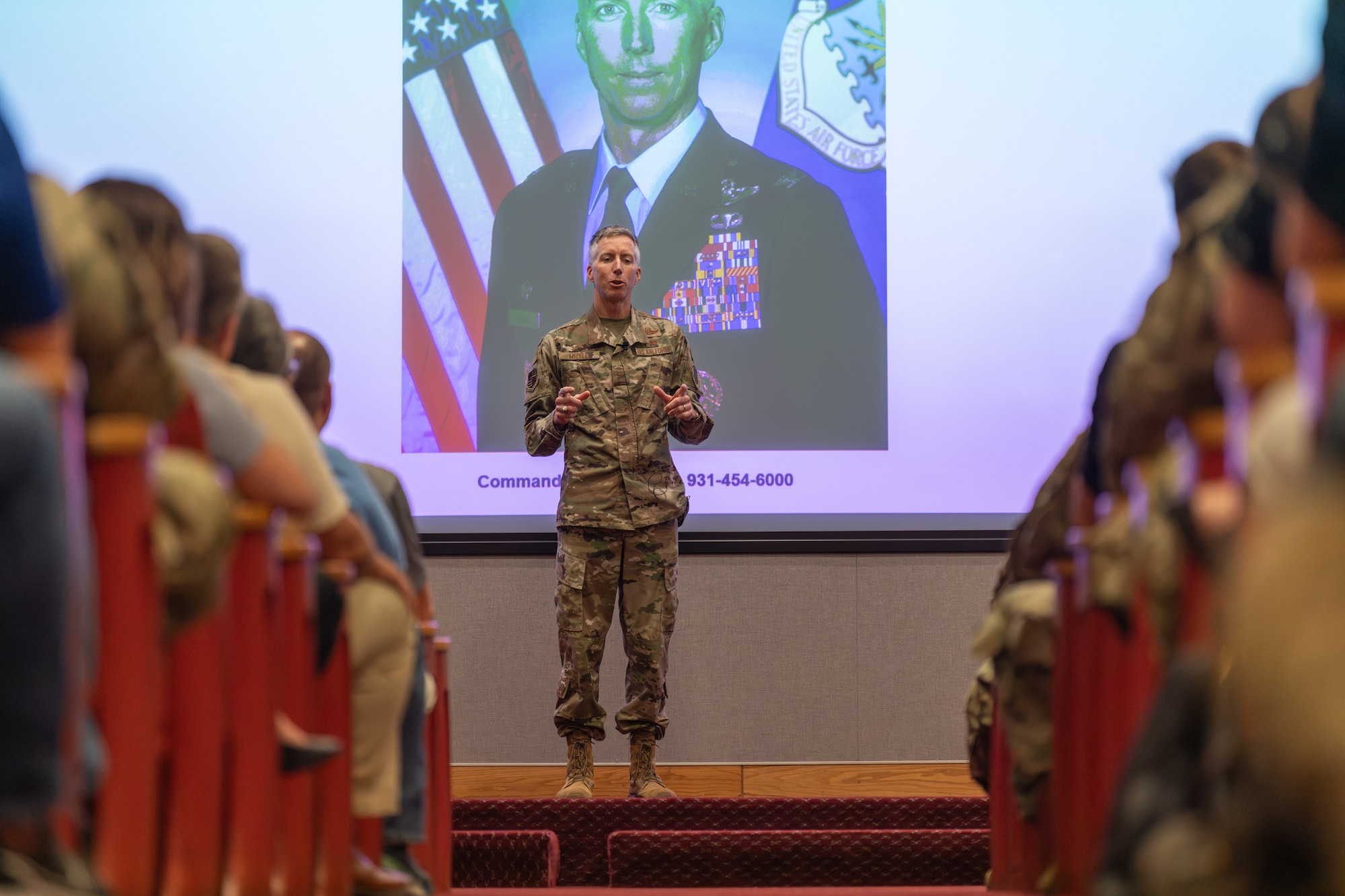 Arnold Engineering Development Complex Commander Col. Grant Mizell speaks July 19, 2024, in the Main Auditorium at Arnold Air Force Base, Tenn., during his first Commander’s Call since taking command of AEDC. During the Commander’s Call, Mizell encouraged AEDC personnel to reach out to complex leadership with concerns, comments and questions. (U.S. Air Force photo by Keith Thornburgh)