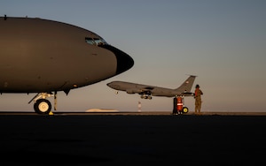 A U.S. Air Force crew chief watches as a KC-135 Stratotanker aircraft takes off from McClellan Airport in Sacramento, California, Aug 5, 2024. As part of the 6th Air Refueling Wing, the 91st ARS operates the KC-135 aircraft conducting air refueling missions necessary to support air mobility missions on a global scale. During Bamboo Eagle, Air Mobility Command assets will support warfighters implementing all-domain combat-power generation from disaggregated basing locations throughout the western part of the U.S., along with distributed command and control, agile logistics, and tactical air-to-air refueling. Bamboo Eagle provides participating units opportunities to highlight Air Force efforts and reoptimize for Great Power Competition and to focus on mission readiness by delivering cross-functional and lethal combat capabilities with the speed and agility required to meet pacing challenges. (U.S. Air Force photo by Tech. Sgt. Alexander Cook)