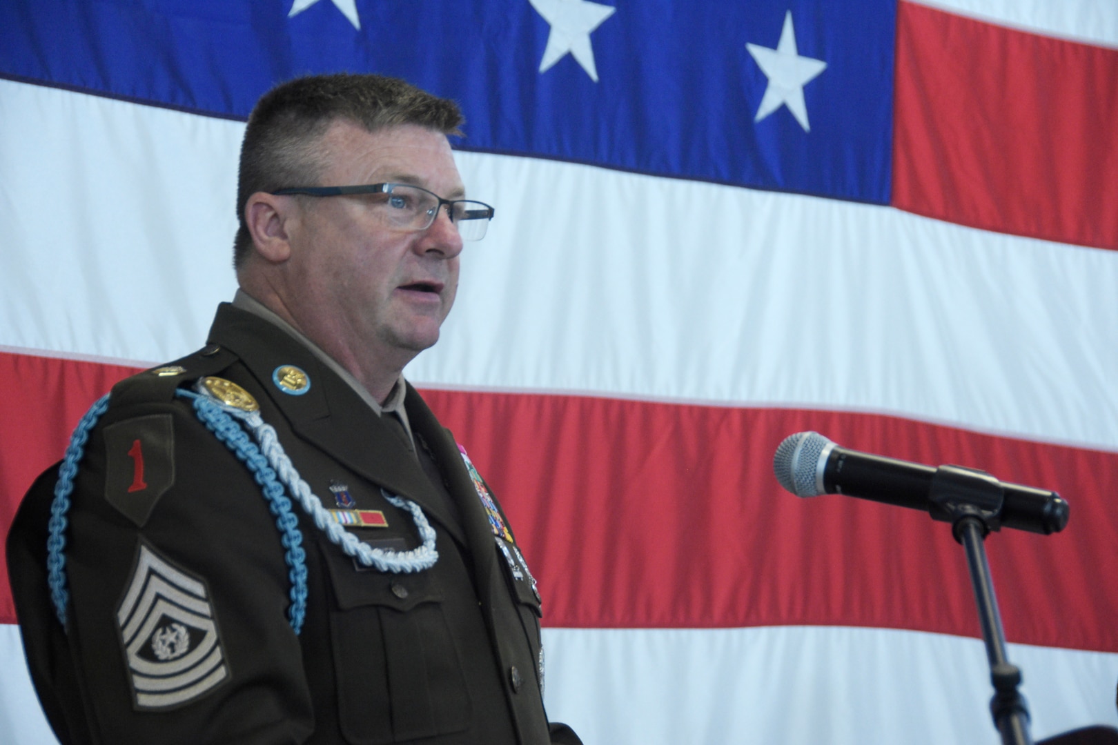 Command Sgt. Maj. Duane Weyer, the Wisconsin Army National Guard’s 10th state command sergeant major, speaks during a formal state command sergeant major change of responsibility ceremony Aug. 10 at Joint Force Headquarters in Madison, Wis. Weyer follows Command Sgt. Maj. Curtis Patrouille as state command sergeant major. Combined, Patrouille and Weyer have more than seven decades of military service between them. Wisconsin Department of Military Affairs photo by Vaughn R. Larson