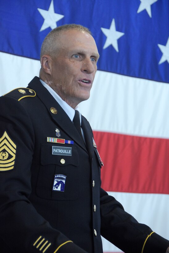 Command Sgt. Maj. Curtis Patrouille, the outgoing state command sergeant major for the Wisconsin Army National Guard, speaks during a formal state command sergeant major change of responsibility ceremony Aug. 10 at Joint Force Headquarters in Madison, Wis. Patrouille relinquished responsibility to the incoming state command sergeant major, Command Sgt. Maj. Duane Weyer. Combined, Patrouille and Weyer have more than seven decades of military service between them. Wisconsin Department of Military Affairs photo by Vaughn R. Larson