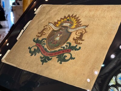 The regimental colors of the 6th Massachusetts Infantry are displayed in a custom case as part of the “Every Flag a Story” exhibit unveiled in a ceremony in Memorial Hall at the State House in Boston. This flag was carried by the regiment during its march through Baltimore when they were attacked by hundreds of Southern sympathizers, resulting in the first bloodshed of the Civil War.