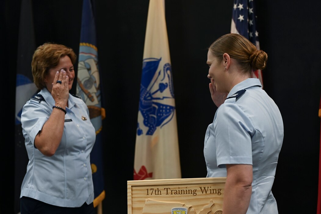 U.S. Air Force Col. Angelina Maguinness, 17th Training Wing commander, addresses the crowd during the 17th Training Wing 2nd Quarterly Commanders Call at the Powell Event Center, Goodfellow Air Force Base, Texas, Aug. 9, 2024. One of Maguinness’ goals is to look past a right-now mindset and further into the 17th TRW and the Airmen that come after. (U.S. Air Force photo by Airman 1st Class Madi Collier)