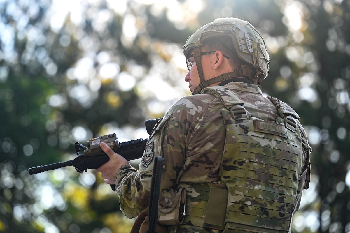 A member from the 19th Security Forces Squadron patrols the area during a locally developed, 30-day training program at Little Rock Air Force Base, Arkansas, Aug. 9, 2024. The purpose of the training program is to reinforce the fundamentals of air base ground defense and prepare Airmen for missions they don’t typically encounter daily.