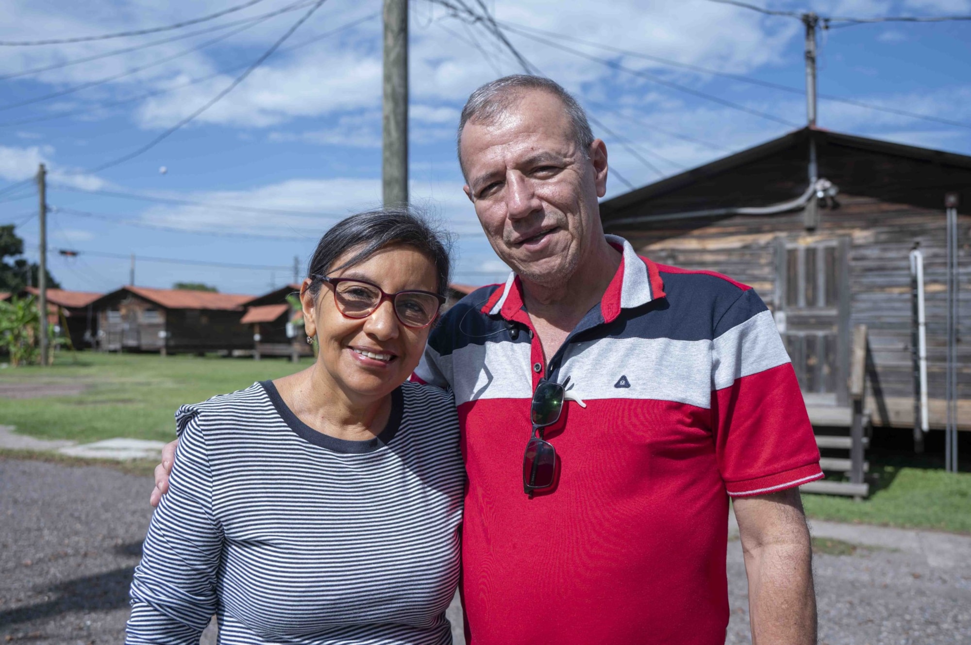 A photo of two people posing for a photo.