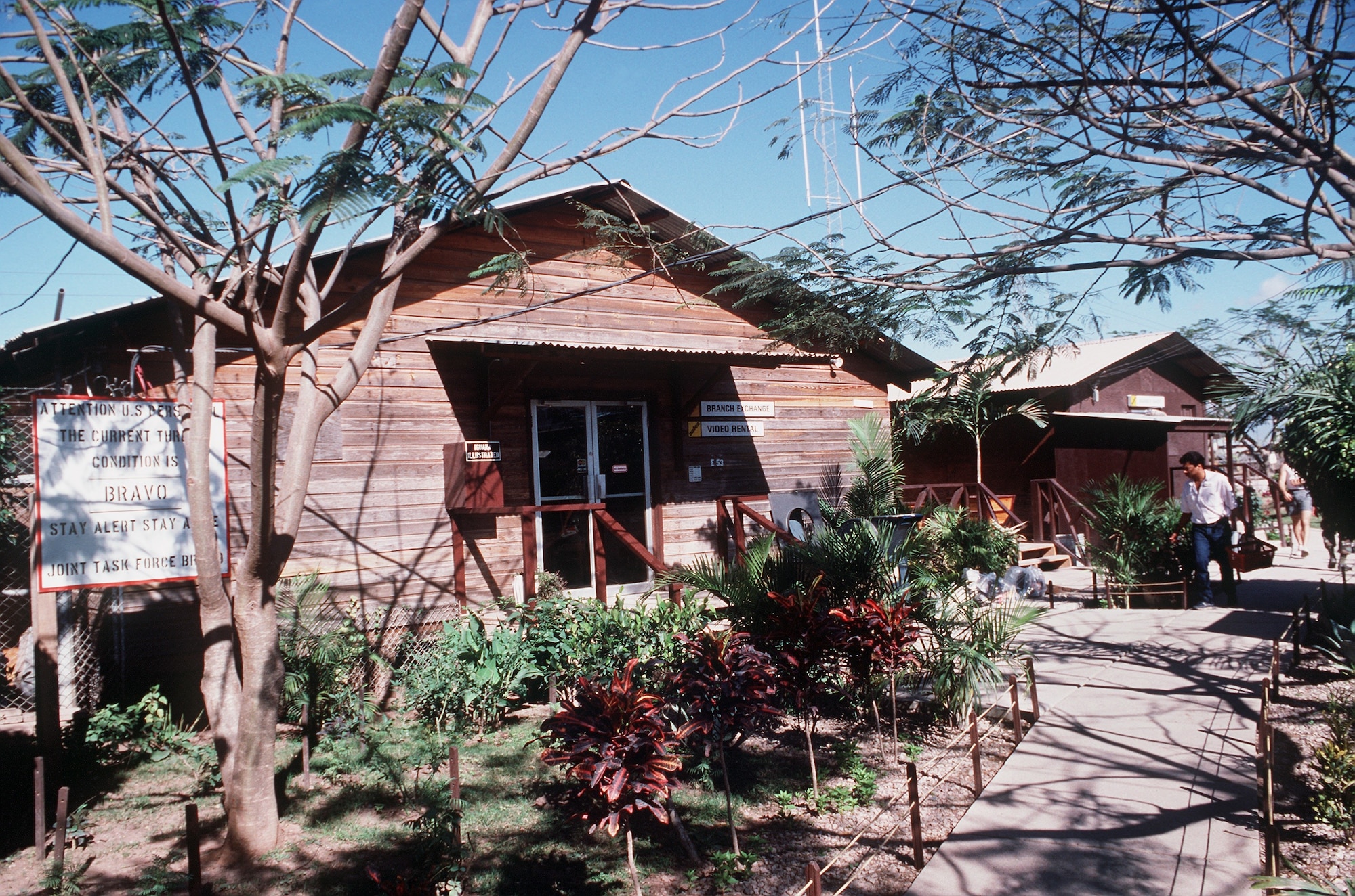 A photo of a line of wooden huts.