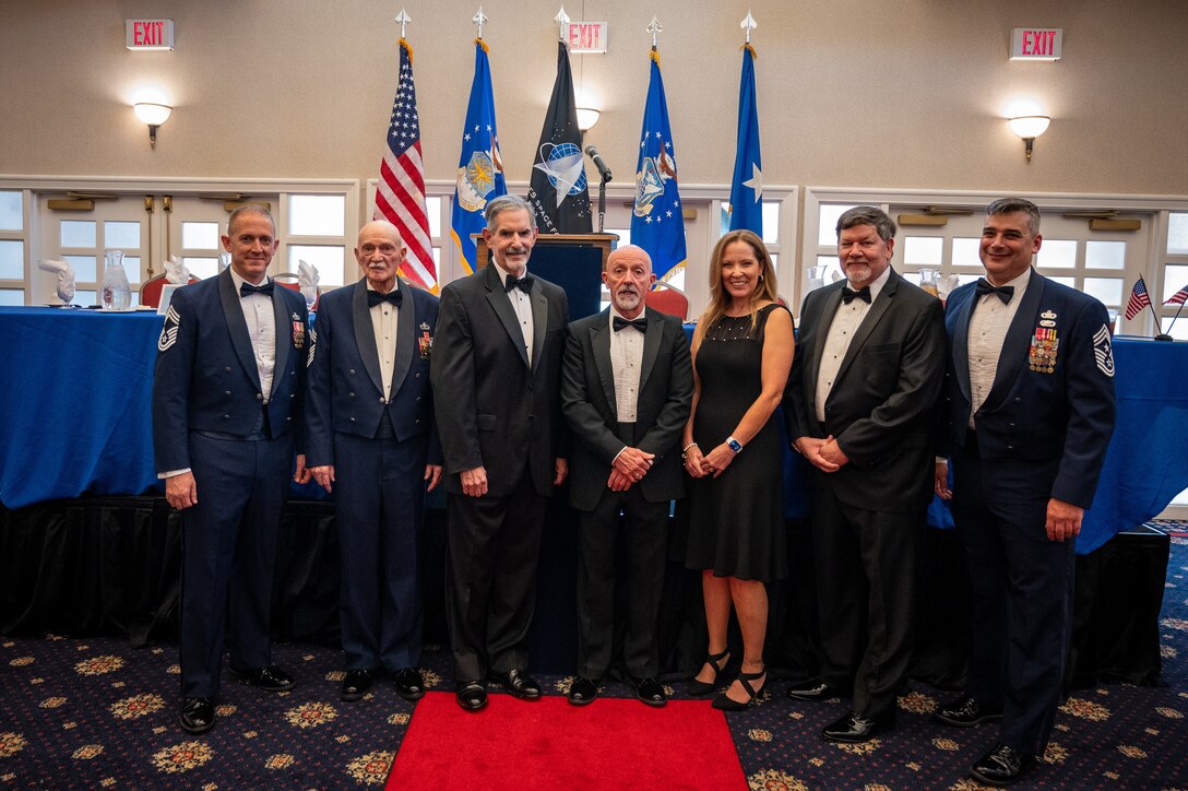 Before the Order of the Sword ceremony July 31, 2024, at Quantico Marine Corps Base, Virginia, OSI chief master sergeants, past and present, gather for a group photo. The assembled chiefs represent a wide range of roles, tenures, and eras in the agency.