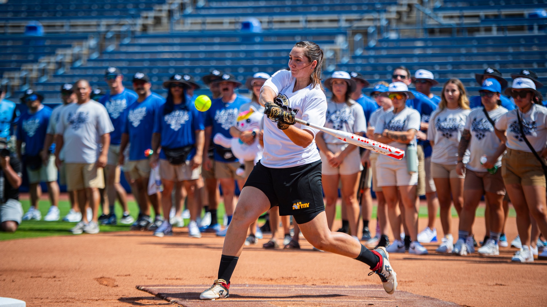 U.S. Army 1st Lt. Katherine Ontiveros, a member of team Army, swings at a softball during a home run derby at the USA Softball Hall of Fame Complex in Oklahoma City, on Aug. 13, 2024. The 2024 Armed Forces Men’s and Women’s Softball Championship hosted by USA Softball at the USA Softball National Hall of Fame Complex from 13-19 August features Service members from the Army, Marine Corps, Navy, Air Force (with Space Force personnel) and Coast Guard.  Teams will battle it out for gold. (U.S. Air Force photo by Staff Sergeant James Crow)