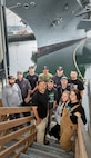 Back row from left: Martin Bridgeford, supervisor, Shop 99, Temporary Services; Frank Sepulveda, general foreman, Shop 99, Temporary Services; Connor Mcneal, Gas Free Tech, Shop 11, Shipfitters; Peter Maupin, general maintenance, Shop 99, Temporary Services; Dustin Pixler, general maintenance, Shop 99, Temporary Services; Domingo Ceralde, Code 300, CVN 70 zone manager. Front row from left: Denny Yamauchi, pipefitter, Shop 99, Temporary Services; Tyler Lathum, general maintenance, Shop 99, Temporary Services; Adam Rogala, general maintenance, Shop 99, Temporary Services; Carrie Doussett, pipefitter, Shop 99, Temporary Services; and Riza Johnson, electrician, Shop 99, Temporary Services. Not pictured: Marvin Rameriz, general maintenance. (U.S. Navy photo by Wendy Hallmark)