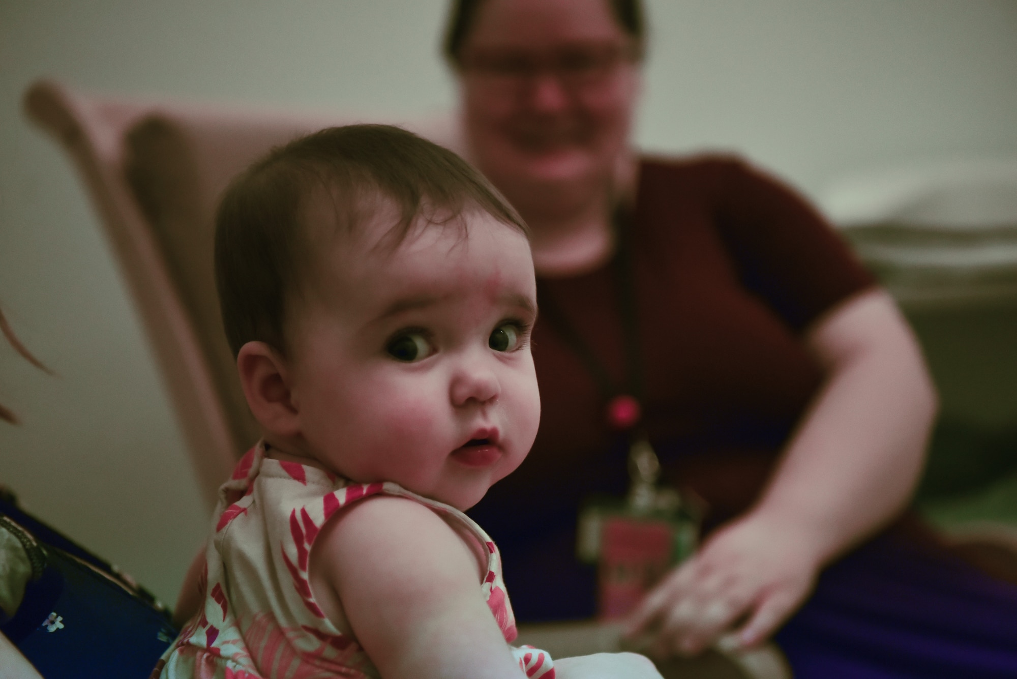 A baby sits on her mom’s lap during a breastfeeding support session at Misawa Air Base, Japan, Aug. 5, 2024.