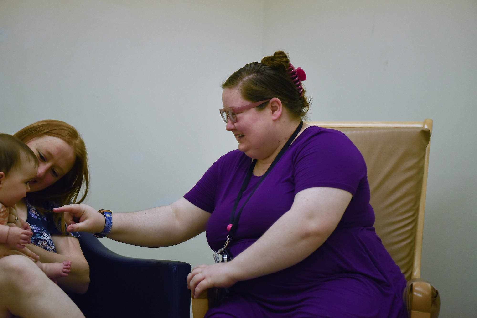 Mandy Wagnild, 35th Surgical Operations Squadron lactation specialist, interacts with a mother and child during a support session at Misawa Air Base, Japan, Aug. 5, 2024.