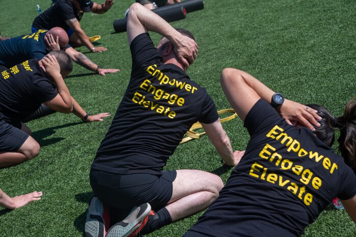 U.S. Space Force and U.S. Air Force Senior Enlisted Leaders from across Space Systems Command work through strength and conditioning exercises with John Hofman, SSC’s certified strength and conditioning specialist, following an educational brief on fitness as part of the inaugural SSC SEL Summit at Los Angeles Air Force Base, Los Angeles, Calif., on July 17, 2024. Hoffman, a member of the Guardian Resilience Team at SSC, led SELs through the importance of remaining “fit for duty” as part of the USSF’s focus on improving the holistic health through mental, emotional, and physical efforts, as well as strengthening the overall resilience for personnel.
