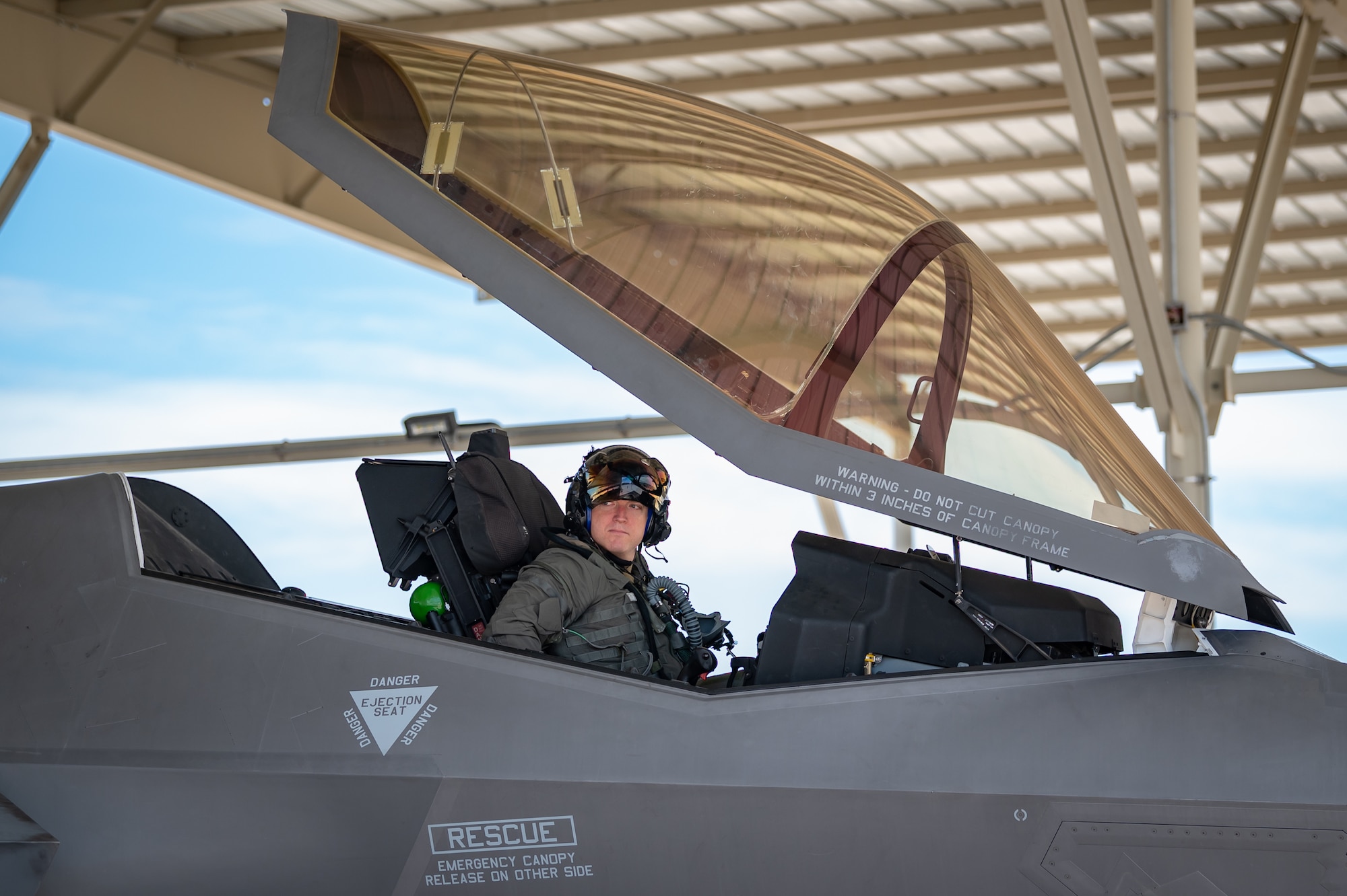 Reserve Citizen Airman Lt. Col. Christopher "Lube" Lowe, an F-35 instructor pilot with the 944th Fighter Wing, is greeted by Airman 1st Class Christian Dickinson, an active-duty crew chief with the 63rd Fighter Squadron, after completing his 1,000th flight hour in the F-35 Lightning II at Luke Air Force Base, Ariz., Aug. 9, 2024. The event was a significant milestone for both Lowe and the entire unit. (U.S. Air Force photo by Tech. Sgt. Tyler J. Bolken)