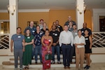 Airmen assigned to the 192nd Wing, Virginia Air National Guard, and their spouses pose for a group photo during the first day of a Strong Bonds Marriage weekend July 19, 2024, at The Founders Inn in Chesapeake, Virginia. Strong Bonds is a chaplain-led program designed to strengthen Airmen’s relationships through education and skills training. (U.S. Air National Guard photo by Staff Sgt. Danielle Lofton)