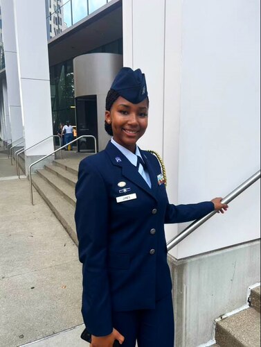 Cadet Aaliyah Jones, a rising senior at Oxon Hill High School in Maryland, poses outside the Kentucky International Convention Center in Louisville, Kentucky