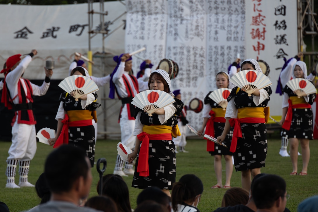 Teodori Eisa dancers with the Namizato District Youth Association perform during the Kin Town Youth Eisa Festival at Kin District Park in Okinawa, Japan, July 28, 2024. The 22nd Kin Town Youth Eisa Festival showcased youth groups performing a modern form of Eisa dancing that was traditionally performed by Japanese Buddhist monks to honor their ancestors. (U.S. Marine Corps photo by Cpl. Jesse Davis)