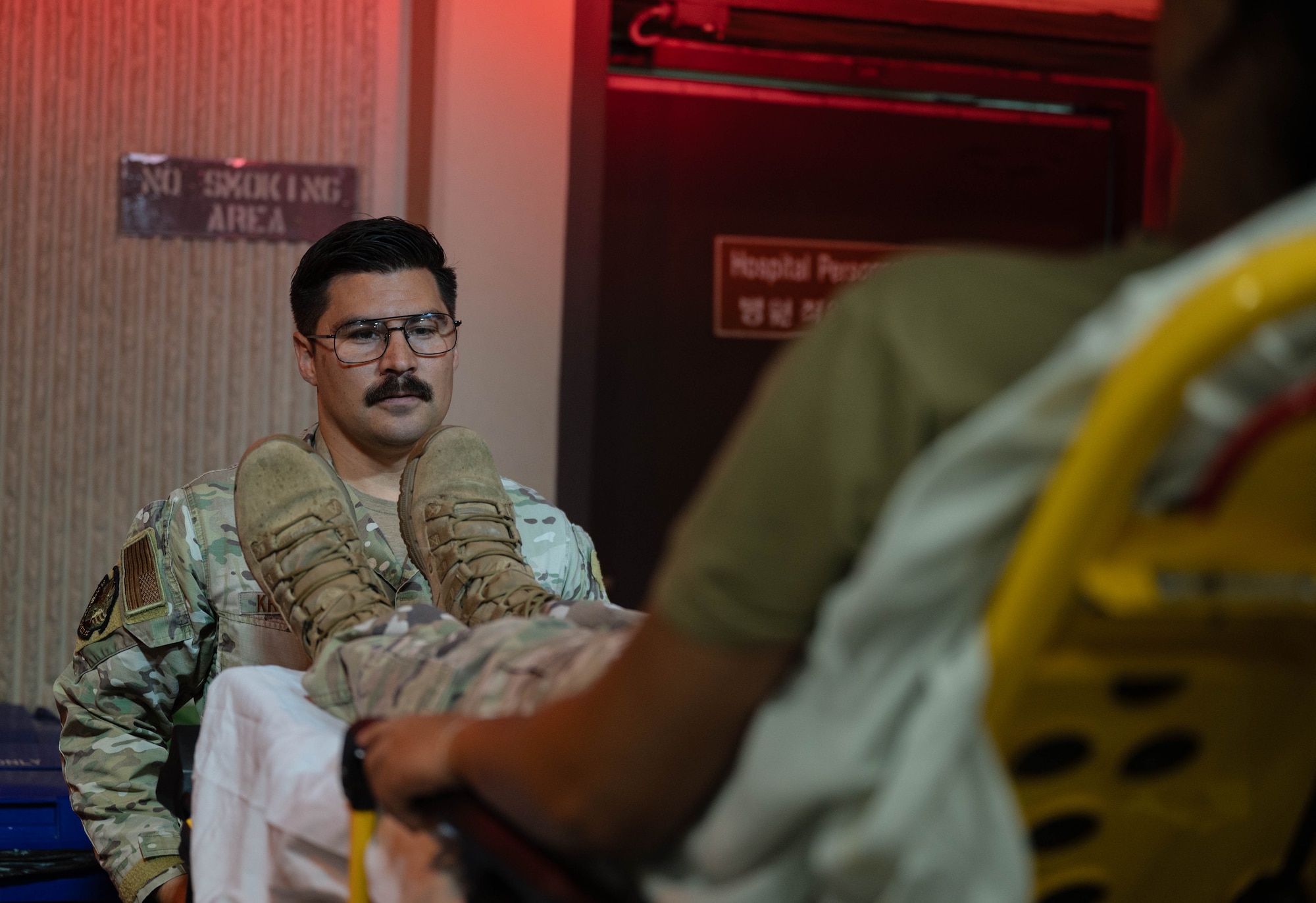 U.S. Air Force Tech. Sgt. Stephen Kreidler, 51st Operational Medical Readiness Squadron independent duty medical technician, transports a patient off an ambulance at Osan Air Base, Republic of Korea, Aug. 13, 2024. An independent duty medical technician is the only enlisted health care provider who can give care in the absence of a licensed, privileged or credentialed health care provider at U.S. Air Force medical treatment facilities, host base medical treatment facilities, remote or deployed sites. (U.S. Air Force photo by Staff Sgt. Christopher Tam)