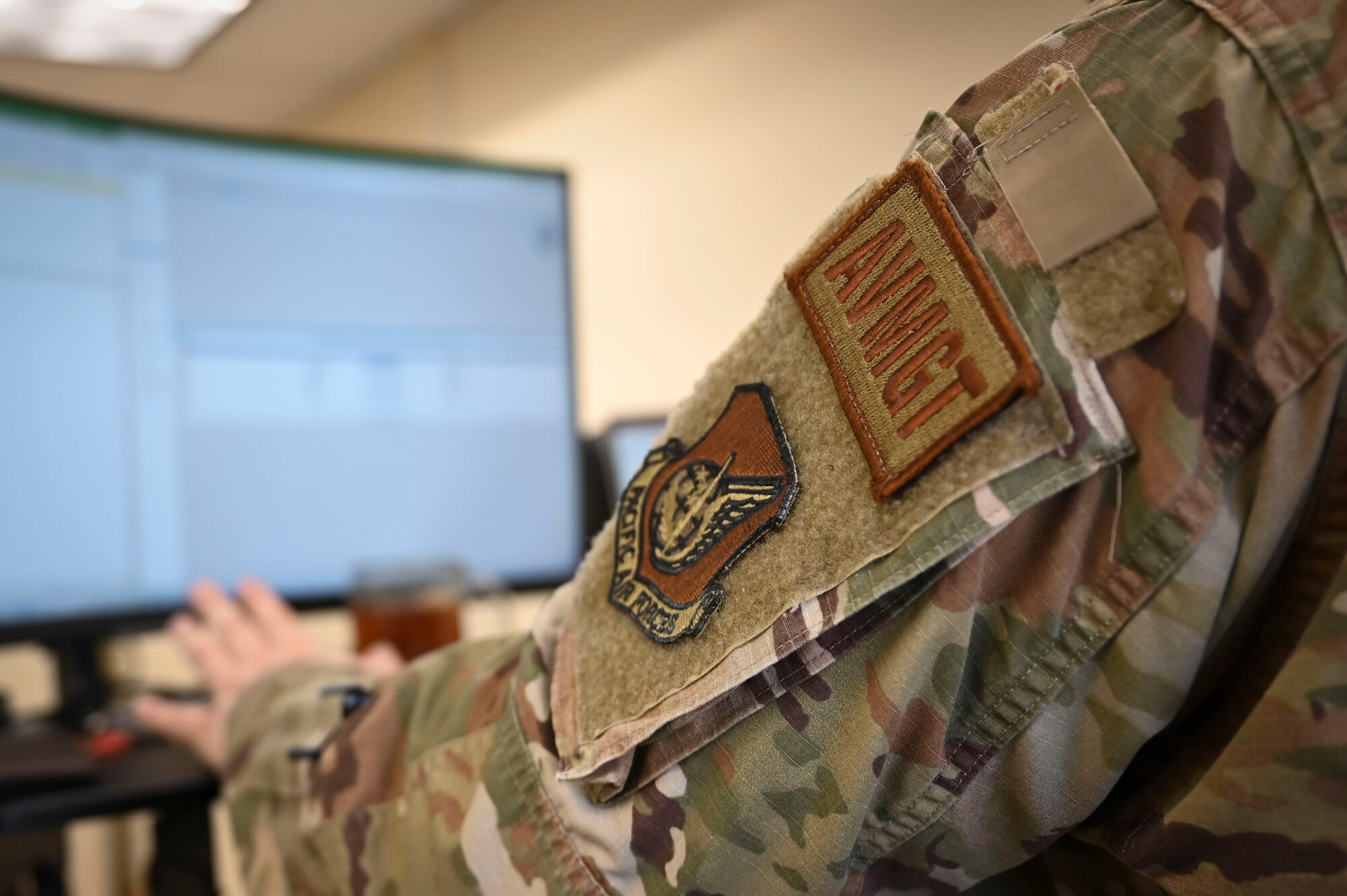 U.S. Air Force Tech. Sgt. Aaron Jennings, 8th Operations Support Squadron noncommissioned officer in charge of current operations flight, reviews flight hours information.