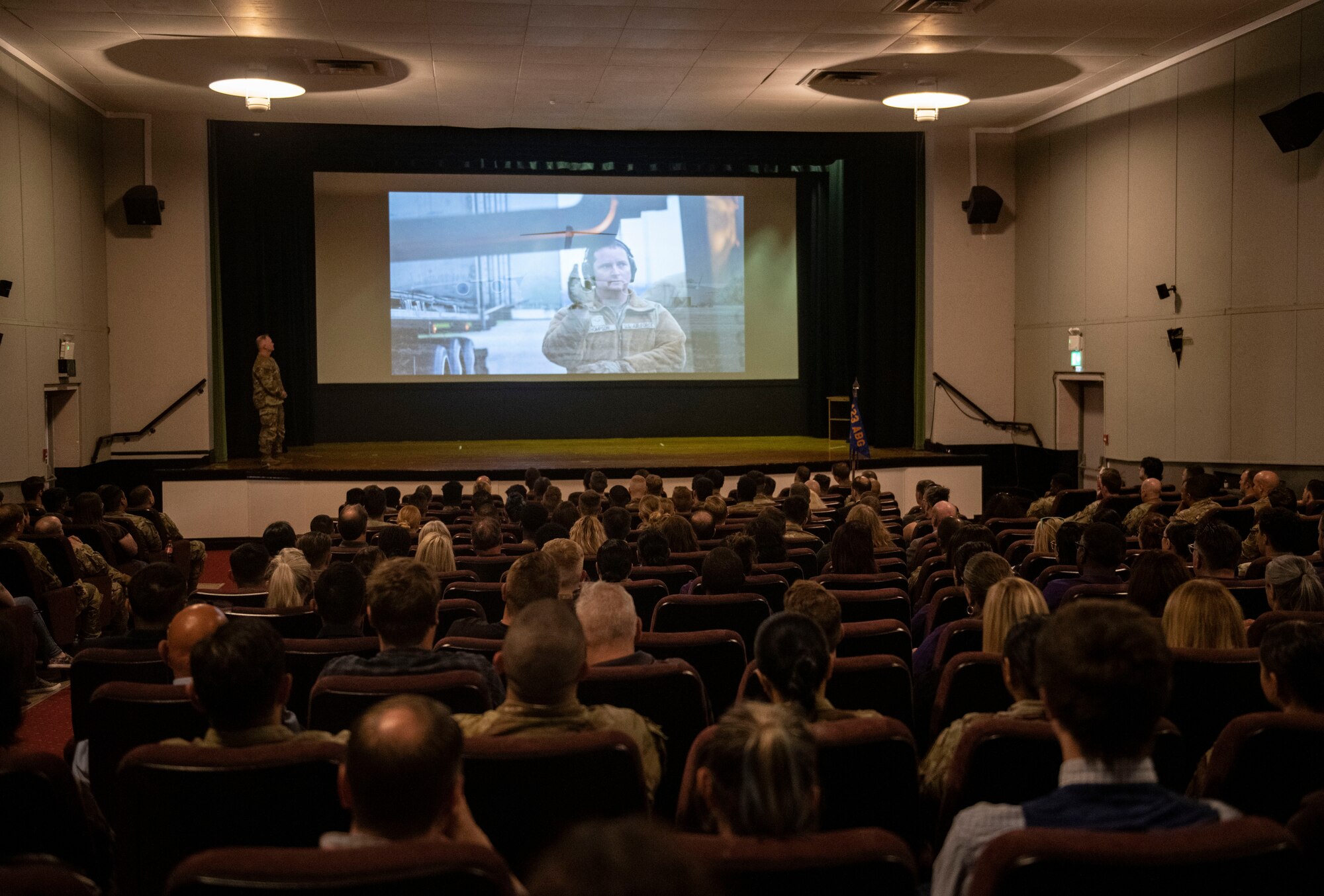 Commander gives remarks during an all call