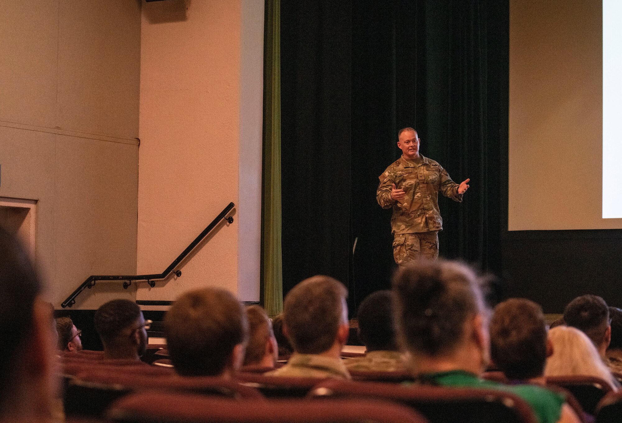 Commander gives remarks during an all call