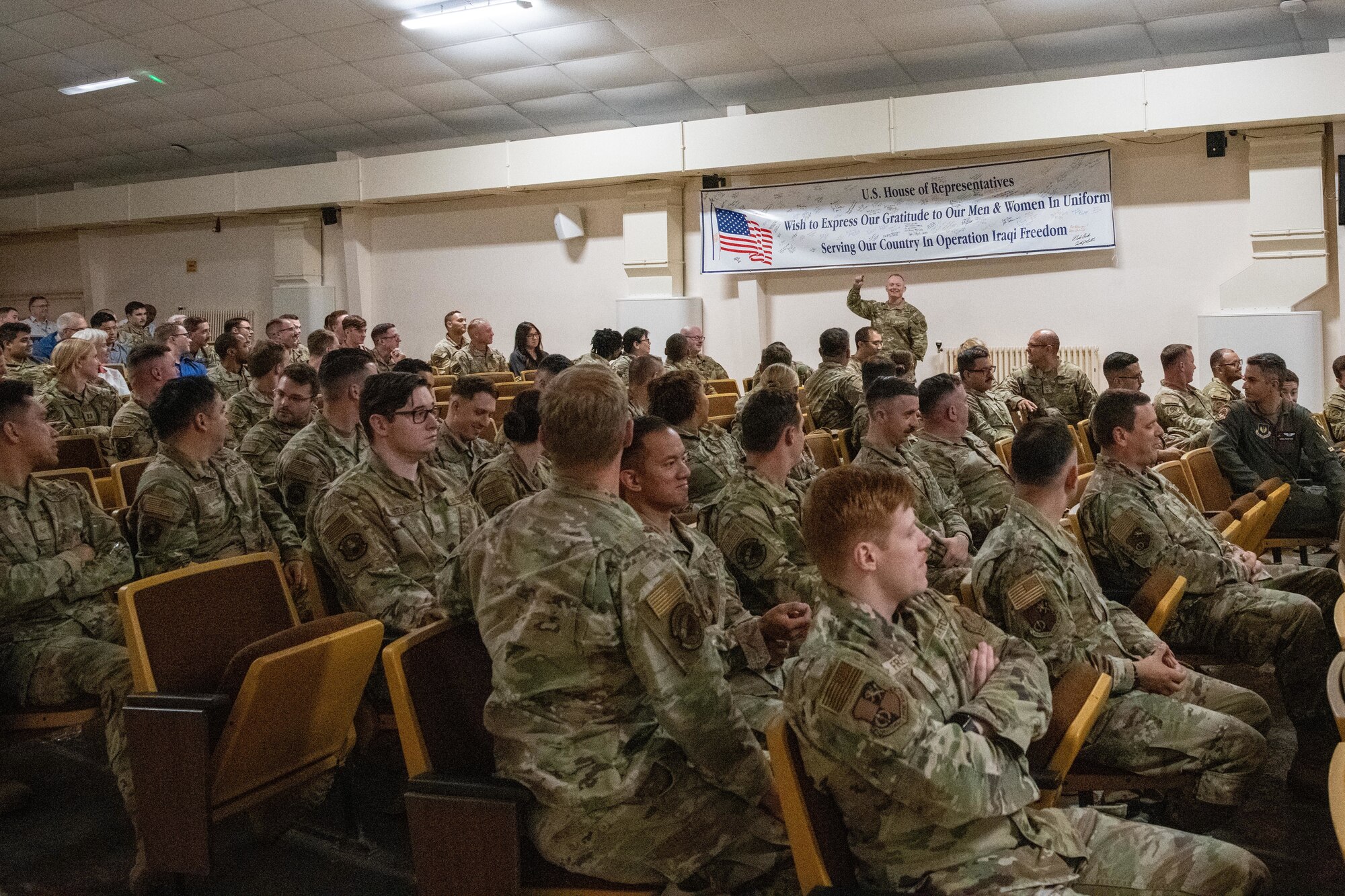 Commander gives remarks during an all call