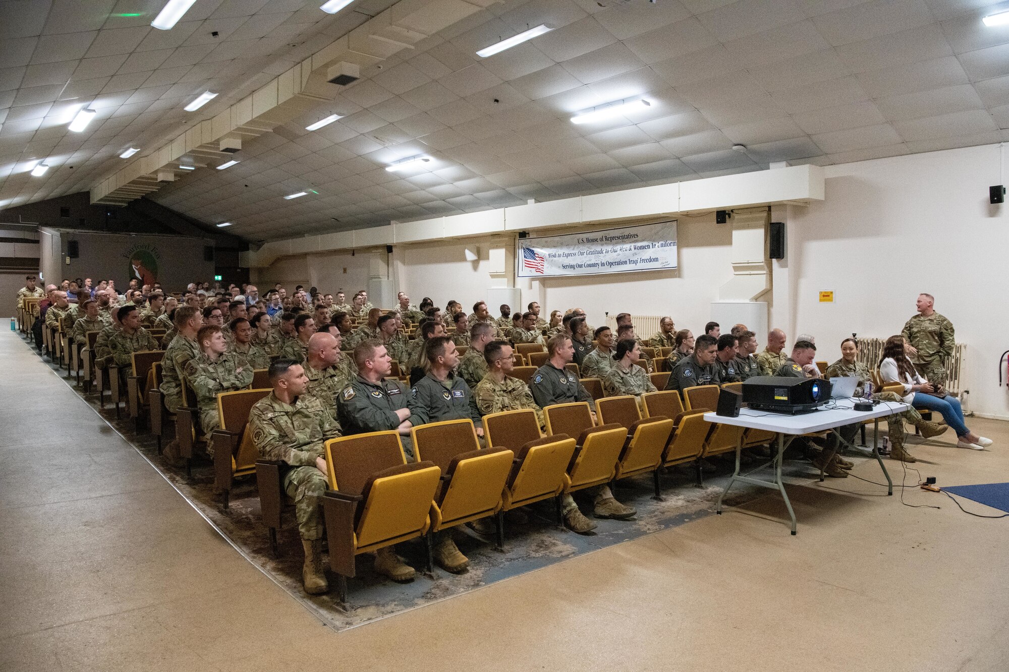 Commander gives remarks during an all call