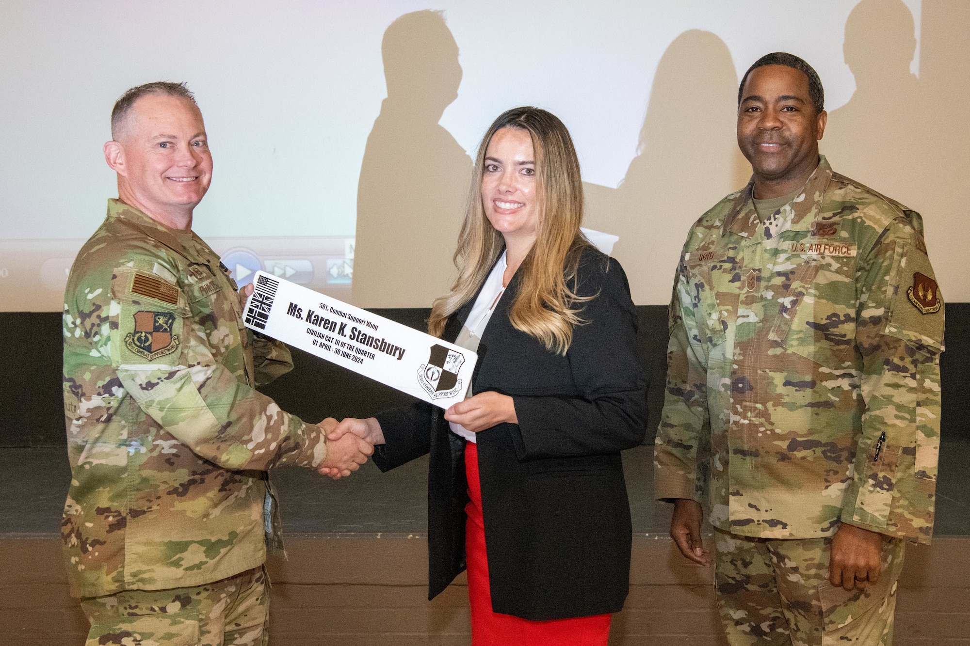 Command team presents award to winner