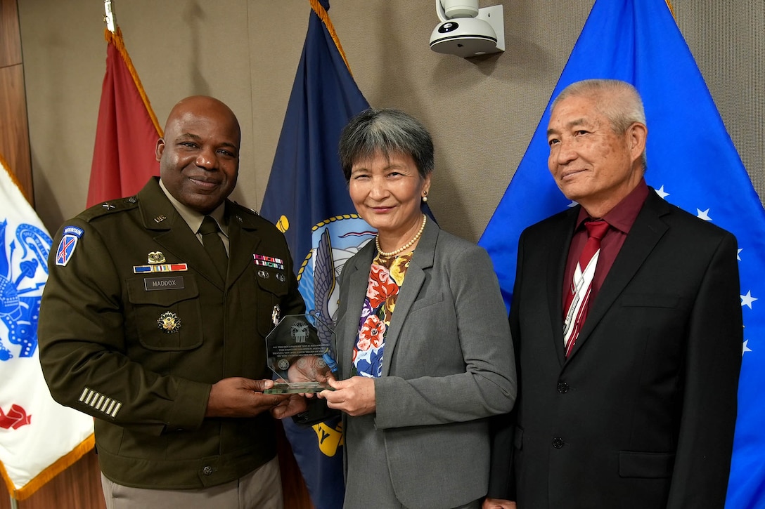Kushiang “Joan” Shiau, her husband and DLA Troop Support Commander Army Brig. Gen. Landis Maddox during Shiau’s retirement from DLA Troop Support on July 25 in Philadelphia. Photo by Ed Maldonado