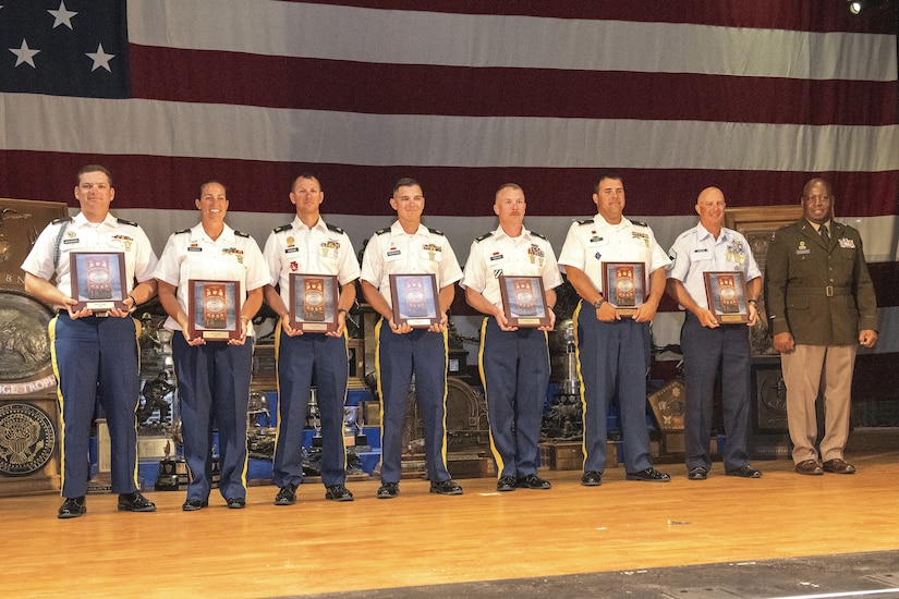 The All National Guard Rifle Team poses for a group photo with Brig. Gen. Jefferson Watkins, far right, Director of the Joint Staff, Ohio National Guard, right, after winning the Hilton Trophy during the National Matches held at Camp Perry, Ohio, Aug. 2, 2024. The team would also win the National Trophy marking it as the third time that the National Guard won the trophy since its inception in 1903. (U.S. Air National Guard photo by Senior Master Sgt. Shawn Monk)