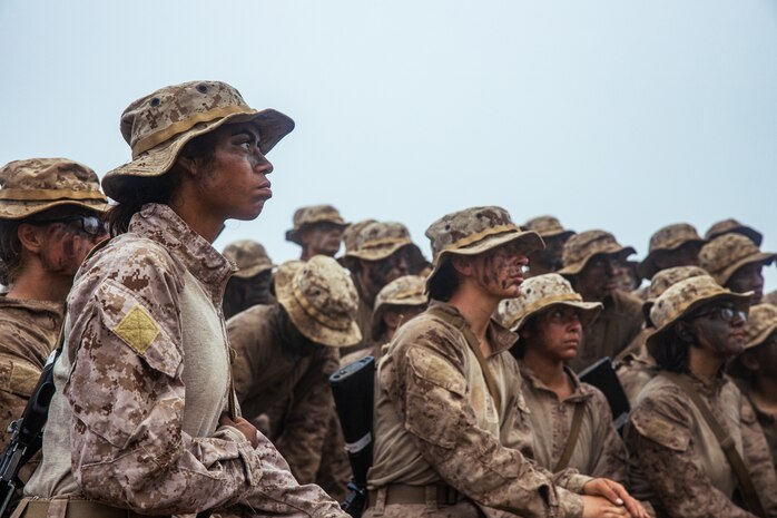 U.S. Marine Corps recruits with Alpha Company, 1st Recruit Training Battalion, listen to their company first sergeant speak before their Eagle, Globe and Anchor Ceremony on Marine Corps Base Camp Pendleton, California, July 31, 2024. The EGA ceremony was the final event of the crucible and represents the transformation of recruit to United States Marine. (U.S. Marine Corps photo by Cpl. Sarah M. Grawcock)