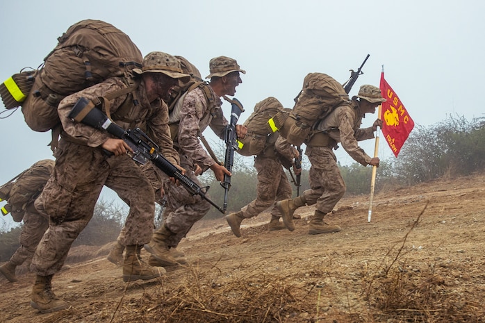 U.S. Marine Corps recruits with Alpha Company, 1st Recruit Training Battalion, hike up the Reaper during the final portion of the Crucible on Marine Corps Base Camp Pendleton, California, July 31, 2024. The Crucible is a 54-hour event where recruits apply the knowledge they have learned throughout recruit training, to earn the title of United States Marine. (U.S. Marine Corps photo by Cpl. Sarah M. Grawcock)