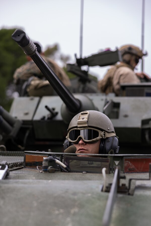U.S. Marine Corps Lance Cpl. Connor Eriksson, an LAV-25 Light Armored Vehicle driver with Alpha Company, 1st Light Armored Reconnaissance Battalion, 1st Marine Division, stops at a range to boresight an LAV-25 Light Armored Vehicle weapons system during Rapid Deployment Exercise at Royal Australian Air Force Base Edinburgh, SA, Australia, July 16, 2024. REDEX is a 1st MARDIV training exercise, with this year’s iteration planned in conjunction with Marine Rotational Force – Darwin 24.3, to rehearse the ability to rapidly deploy capabilities from Marine Corps Base Camp Pendleton, California, U.S., to Australia. 1st LAR tested the logistical efficiency and unit readiness required to rapidly deploy a heavy equipment unit within the U.S. Indo-Pacific Command theater by strategic lift and rail to participate in Exercise Predator’s Run 24. Eriksson is a native of California. (U.S. Marine Corps photo by Cpl. Earik Barton)