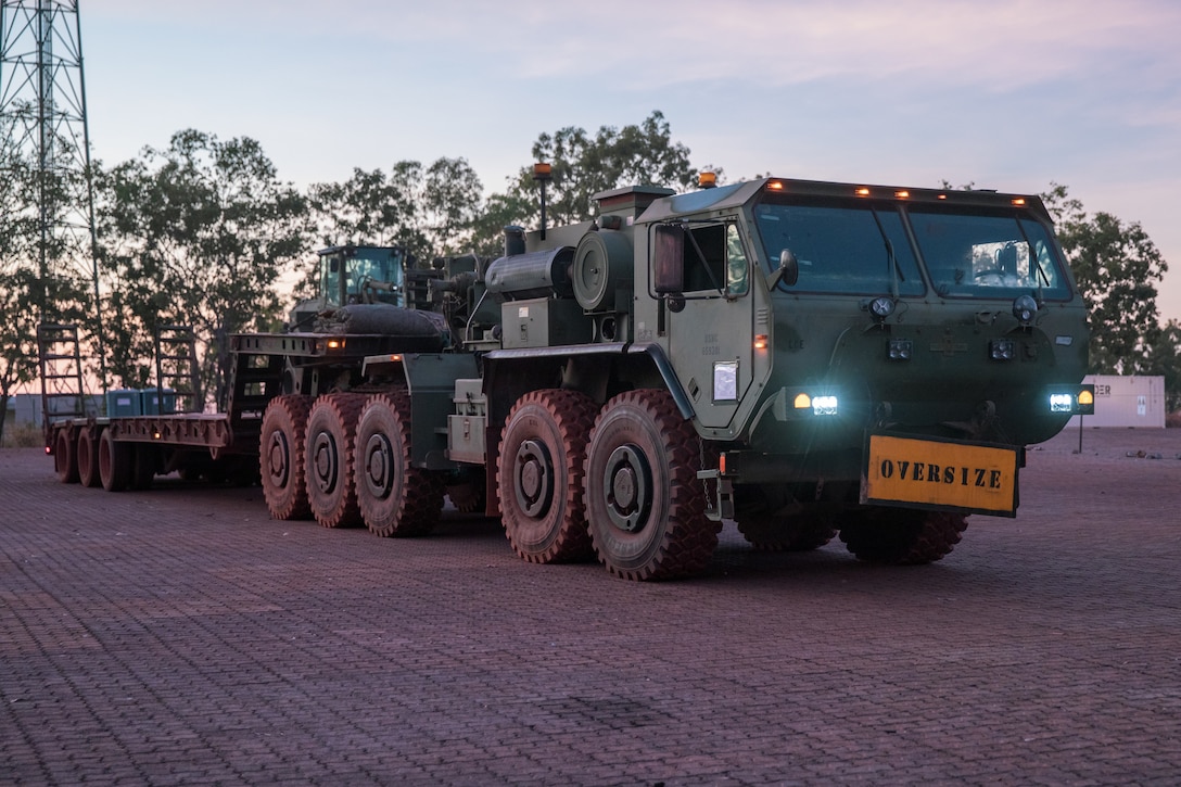 U.S. Marines with Combat Logistics Battalion 5 (Reinforced), Marine Rotational Force – Darwin 24.3, prepare to drive a Logistics Vehicle System Replacement during Exercise Predator’s Run 24 at Mount Bundey Training Area, NT, Australia, July 16, 2024. Exercise Predator’s Run 24 is a littoral-focused, multilateral training exercise led by the Australian’s Army 1st Brigade, involving the Australian Defence Force, the United Kingdom Commando Force, the Republic of the Philippines Army, the U.S. Marine Corps and the U.S. Navy. MRF-D 24.3’s Logistics Combat Element, CLB-5(Rein.), provided comprehensive combat service support, logistics support, and enhanced health service support in a disaggregated environment. (U.S. Marine Corps photo by Cpl. Migel A. Reynosa)