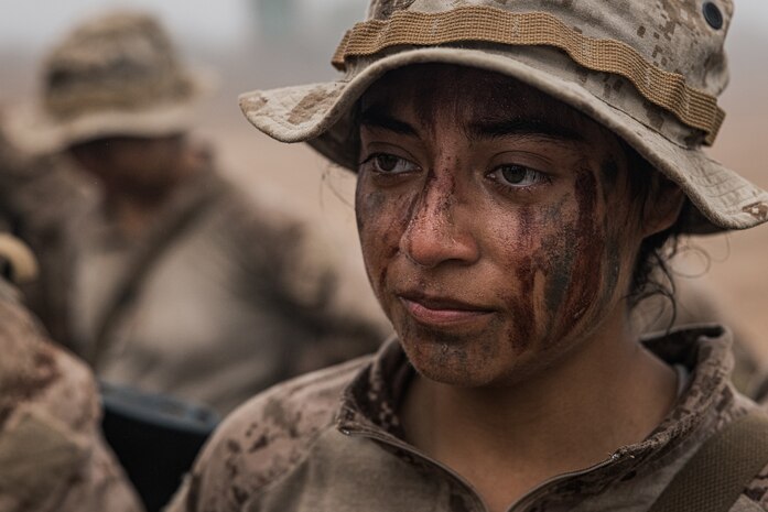 U.S. Marine Corps Pvt. Lizbeth Tenemaza-Loja with Alpha Company, 1st Recruit Training Battalion, stands in formation after completing the Reaper hike at Marine Corps Base Camp Pendleton, California, July 31, 2024. The Reaper hike is the last event recruits must complete before they earn the title of United States Marine (U.S. Marine Corps photo by Lance Cpl. Jacob B. Hutchinson)