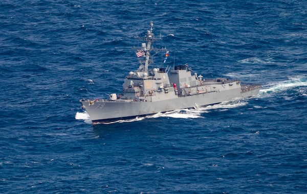 The Arleigh Burke-class guided-missile destroyer USS Oscar Austin (DDG 79) stations during a photo exercise in support of exercise Formidable Shield 2023 while operating in the North Atlantic Ocean, May 15, 2023.