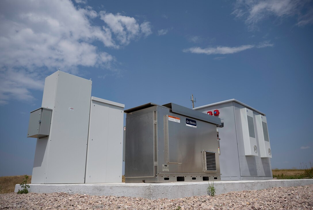 A Battery Energy Storage System (BESS) consisting of a battery, microgrid controller, and power electronics in Box Elder, S.D., 22 July, 2024. The BESS was created and installed as a backup power source to provide resilience for Ellsworth Air Force Base’s and Rapid City Regional Airport’s grids. (U.S. Air Force photo by Senior Airman Josephine Pepin)