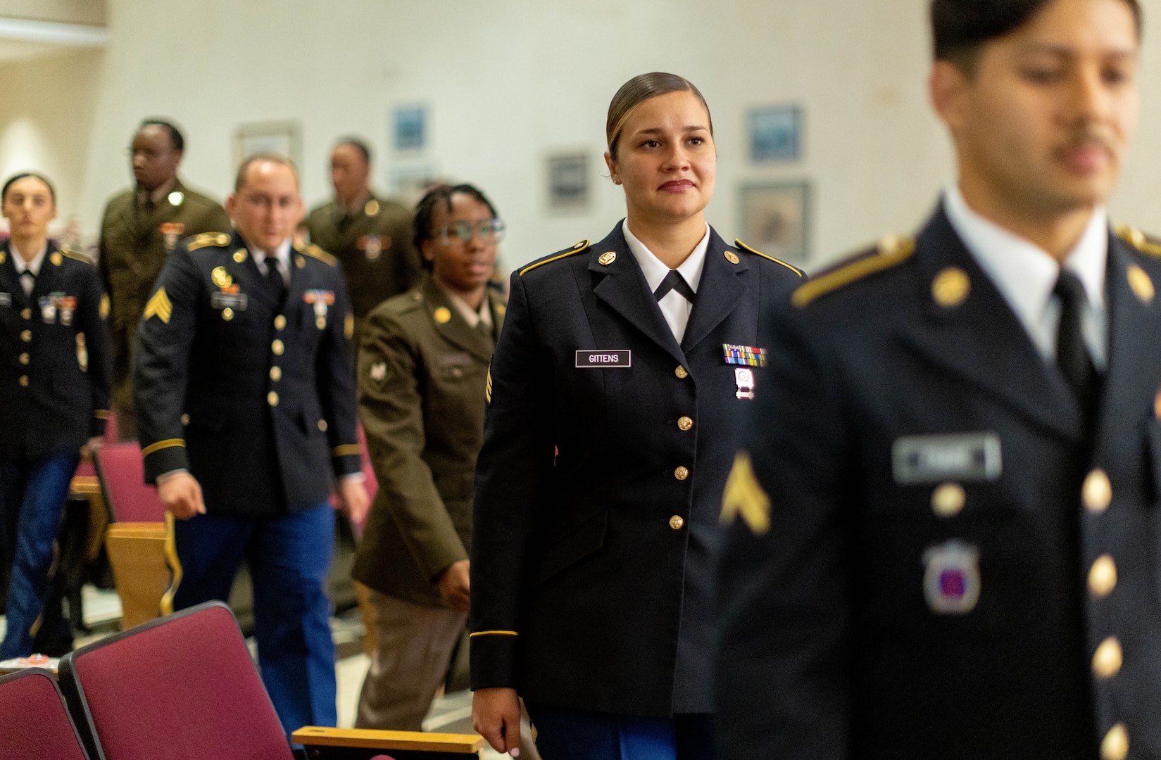 Soldiers graduate from the U.S. Army Practical Nurse, Phase II, as part of Class 23-009, during a ceremony held in Memorial Auditorium at Walter Reed National Military Medial Center on Aug. 9, 2024.