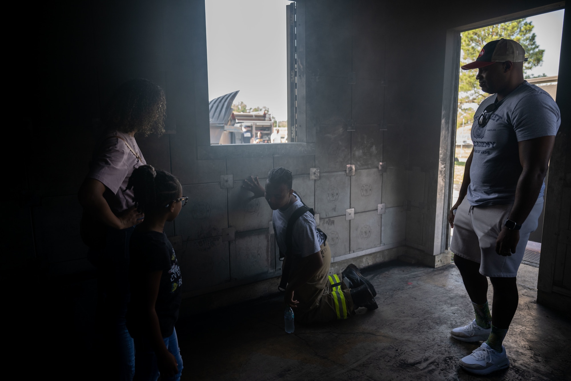 Family goes through smokey room