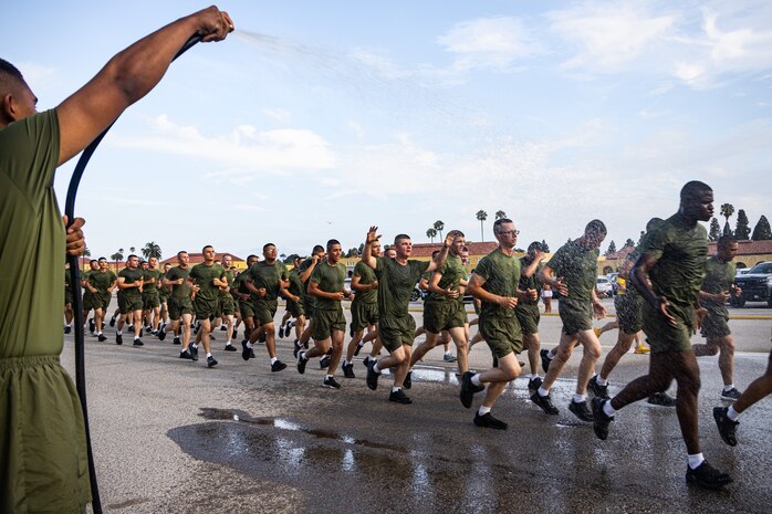 U.S. Marines with Hotel Company, 2nd Recruit Training Battalion, conduct the motivational run at Marine Corps Recruit Depot San Diego, California, August 1, 2024. The company motivational run is a three-mile cadence run conducted around the Depot and is the last physical training event the Marines will conduct before they graduate from MCRD San Diego. The event is also the first time friends and families will see their newly transformed Marines. (U.S. Marine Corps photo by Lance Cpl. Eric Valerio)