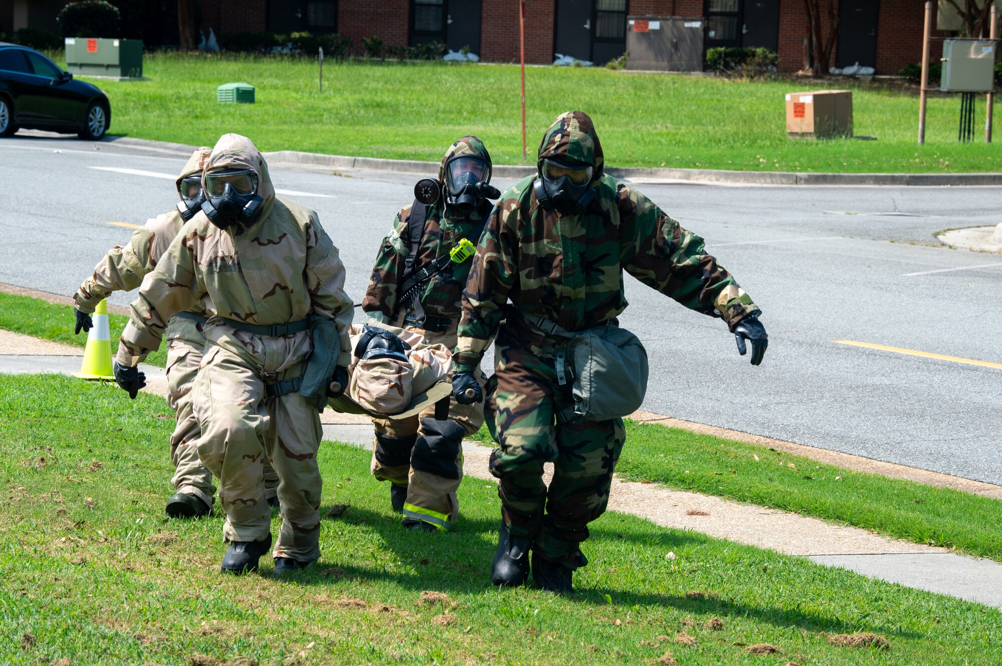 U.S. Air Force Airmen assigned to Moody Air Force Base participate in a CBRN Rodeo at Moody Air Force Base, Georgia, August 12, 2024. Participants at this station were expected to decontaminate a patient and deliver them to a new location properly. (U.S. Air Force photo by Airman 1st Class Iain Stanley)