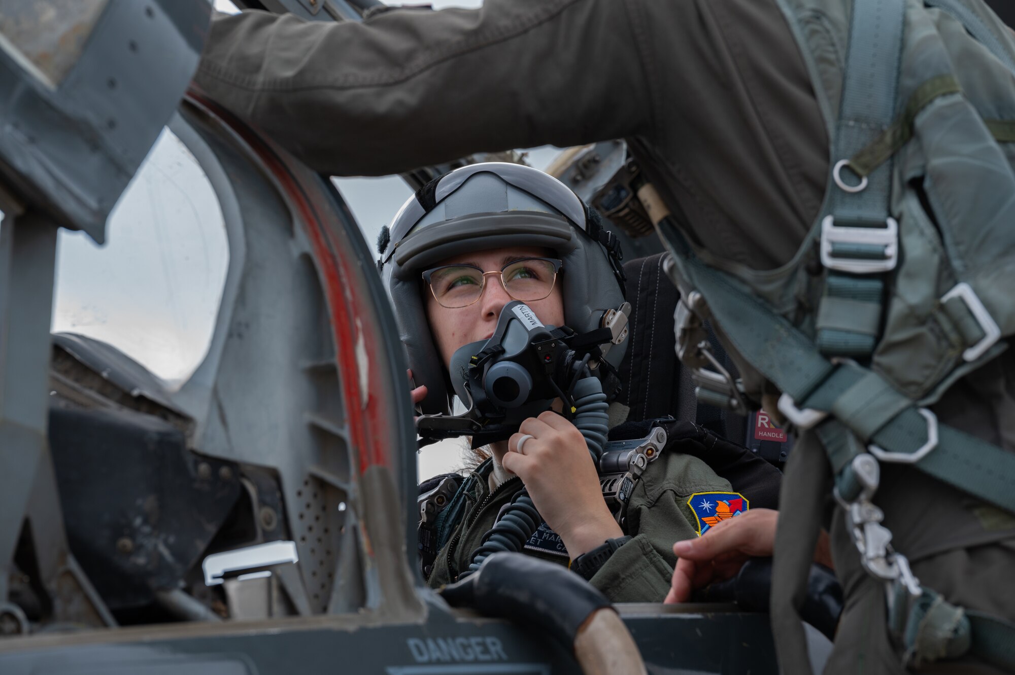 Civil Air Patrol cadet, Emma Martin, straps into the cockpit of a T-38C Talon on the flightline, Laughlin Air Force Base, Aug. 1, 2024. Martin is one of few cadets that got to flight in the T-38 during their visit to Laughlin Air Force Base. (U.S. Air Force photo by Airman 1st Class Harrison Sullivan)