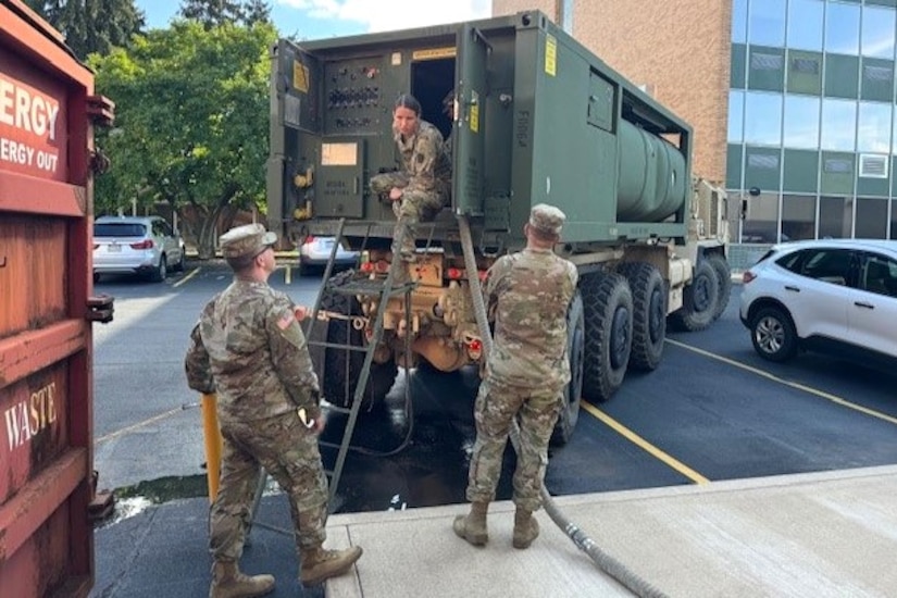 U.S. Soldiers with the 628th Aviation Support Battalion, 28th Expeditionary Combat Aviation Brigade, 28th Infantry Division provide potable water to Penn State Health Holy Spirit Medical Center at Camp Hill, Pennsylvania, Aug. 10, 2024. An emergency water advisory affected nearly 42000 customers in that part of the commonwealth and these Soldiers responded to a call from the Pennsylvania Emergency Management Agency for the Pennsylvania National Guard to assist. (Courtesy Photo)