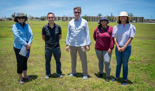 Archaeologists pose for a photo with Andersen Air Force Base's historian at Andersen AFB, Guam, August 9, 2024. The archaeologists visited Andersen to see the location of "Tin City" a refugee camp that housed and processed around 40 thousand Vietnam War refugees during Operation New Life. (U.S. Air Force photo by Staff Sgt. Pedro Tenorio)