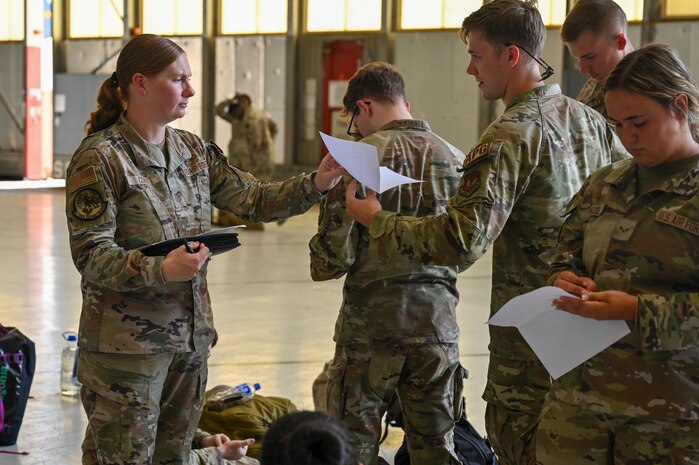 U.S. Air Force Tech. Sgt. Tasha Cobbs, 9th Force Support Squadron force management, in-processes Airmen arriving at Edwards Air Force Base, California, on Aug. 2, 2024.