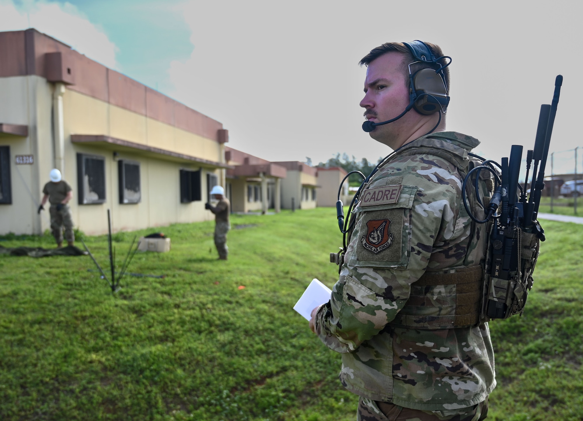An Airman observes and supervises students in the Initial Qualification Training course.