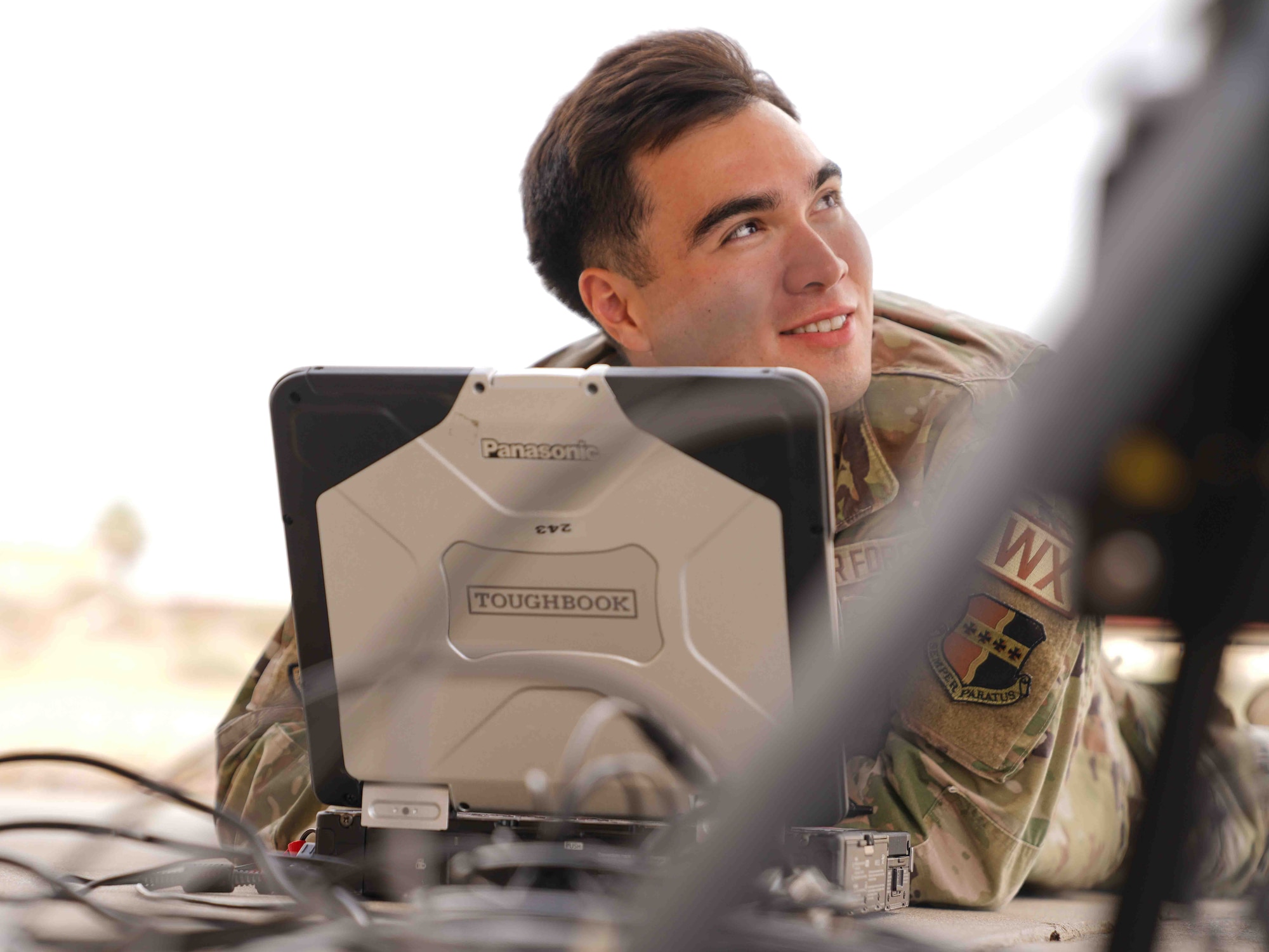 U.S. Air Force Senior Airman Raymond Eberle, 9th Operations Support Squadron weather forecaster, troubleshoots a weather forecasting system at Edwards Air Force Base, California, Aug. 2, 2024.