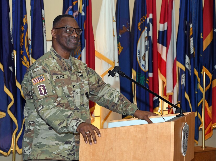 Col. Gary Cooper, outgoing commander of the U.S. Army Medical Materiel Agency, smiles in response to the crowd during a change of command ceremony Aug. 9 at Fort Detrick, Maryland. Cooper passed command to Col. Joselito “Joe” Lim during the... (C.J. Lovelace)