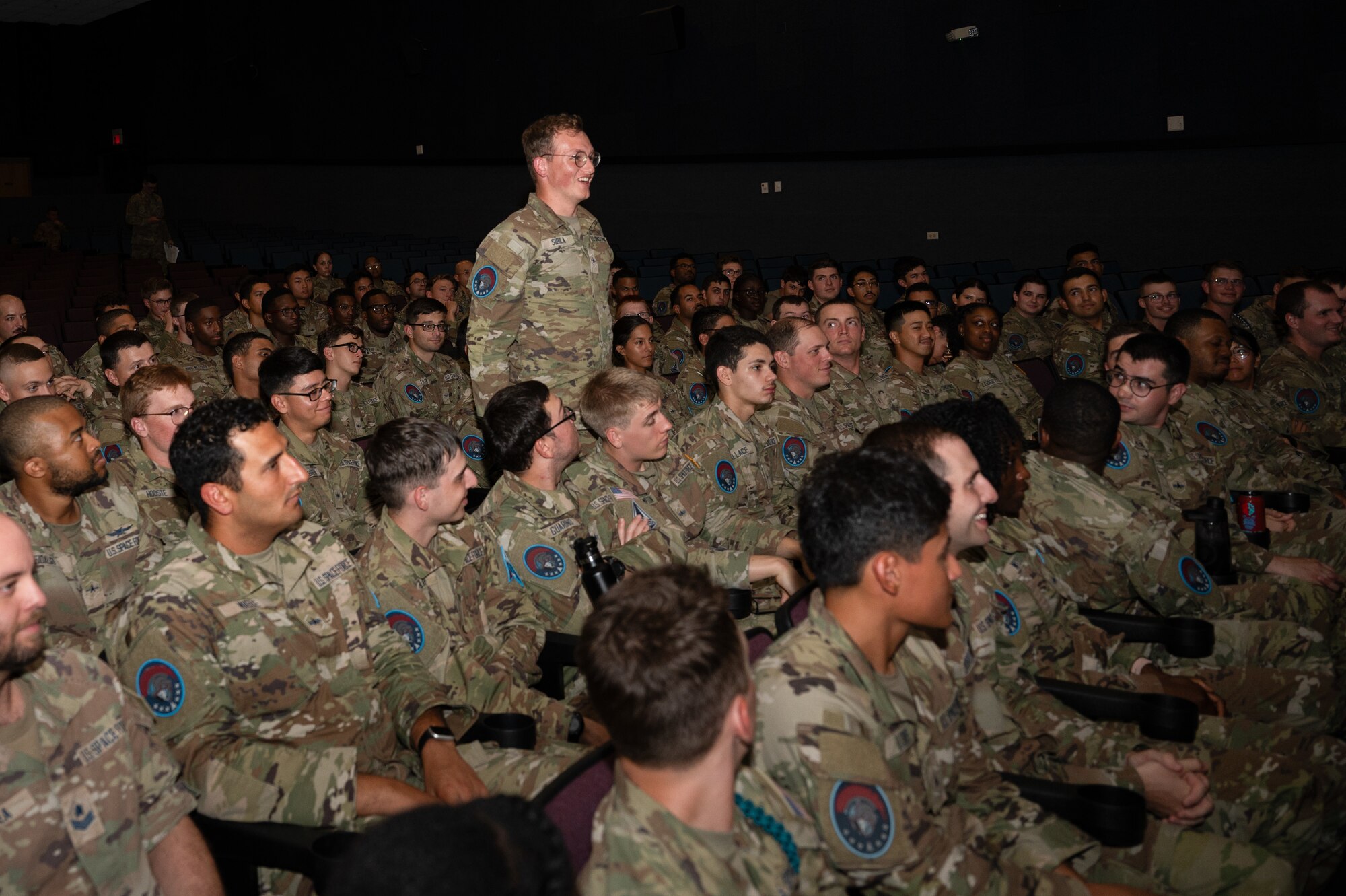 A U.S. Space Force Guardian assigned to the 533rd Training Squadron Det 2 asks a question during Chief Master Sergeant of the Space Force John F. Bentivegna's Guardian all-call at Keesler Air Force Base, Mississippi, Aug. 9, 2024.