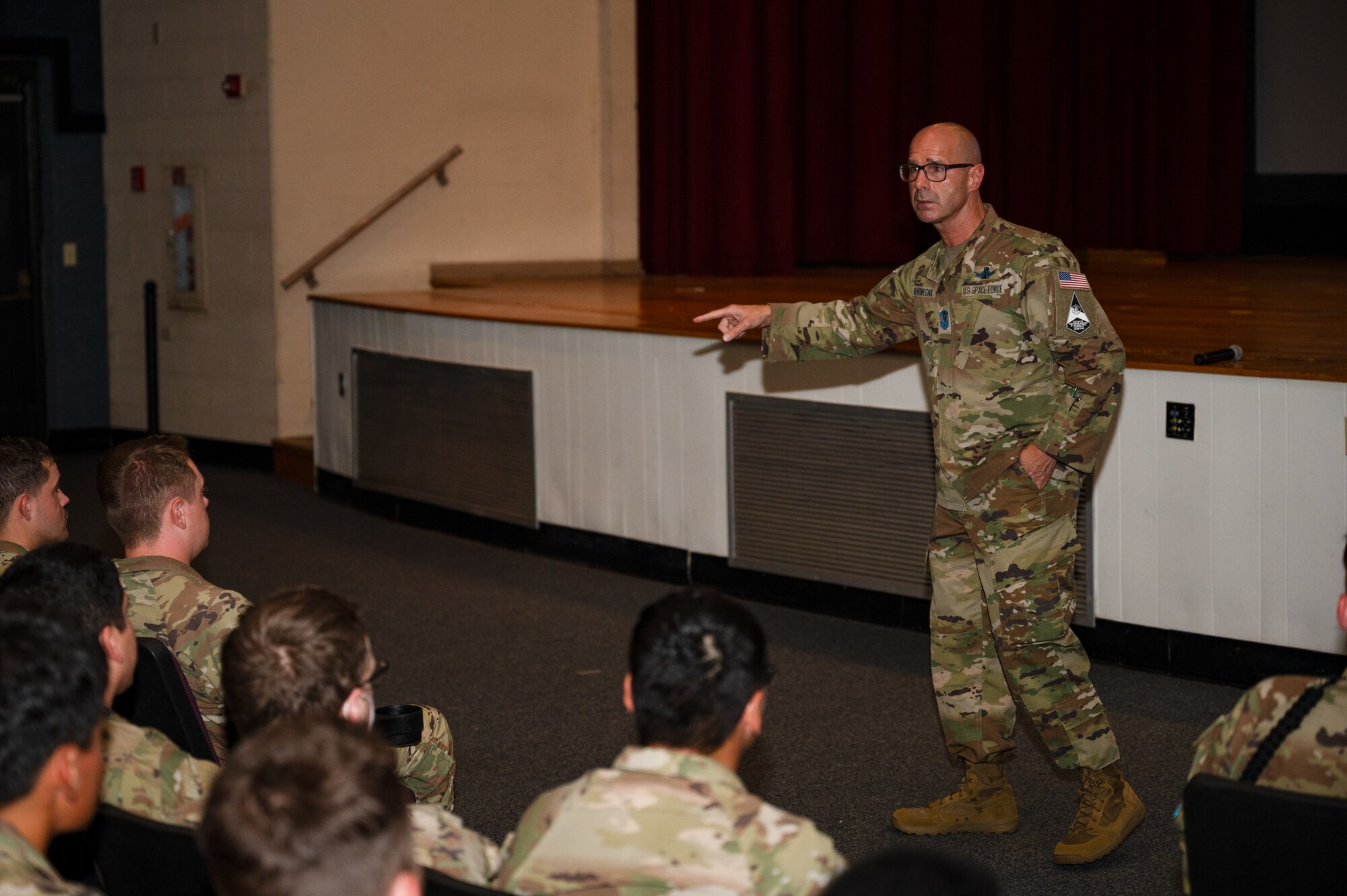 Chief Master Sergeant of the Space Force John F. Bentivegna speaks to Guardians during a Guardian all-call at Keesler Air Force Base, Mississippi, Aug. 9, 2024.